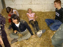 Picture - Kids playing in the horse stable 