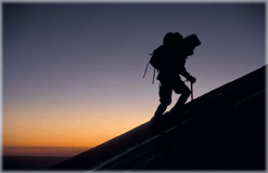 Picture - Person climbing a mountain