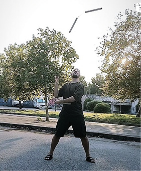 Andrea Barra throwing his nunchaku