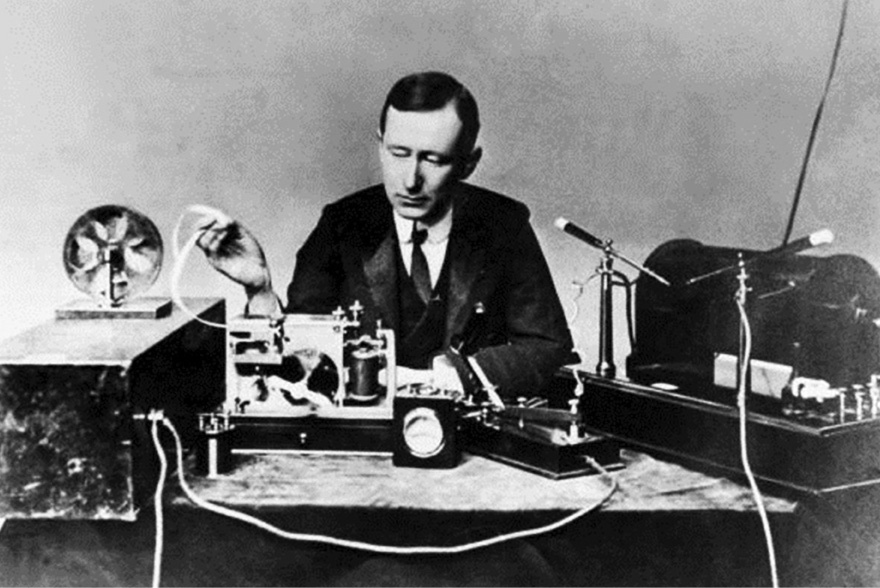 Guglielmo Marconi and the transmitter used to send wireless signals - 1901