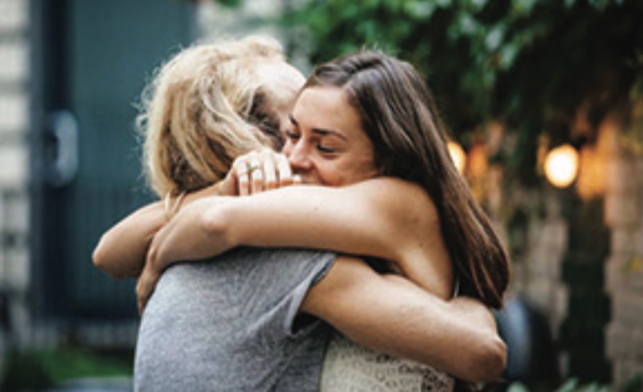 Young people hugging each other