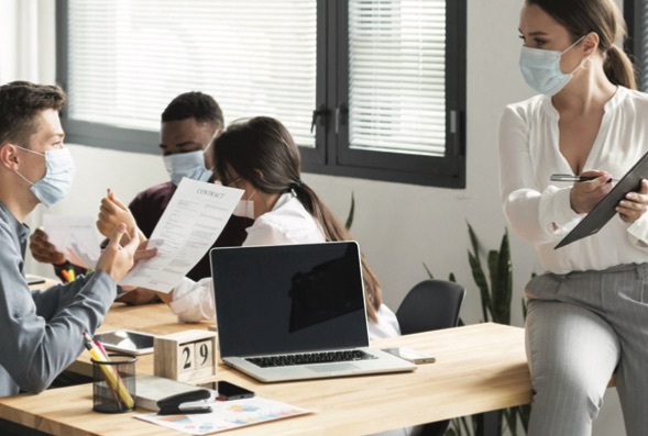 Office employees with masks