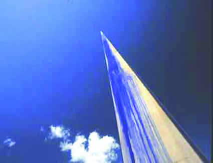 View of a skyscraper with the sky in the background