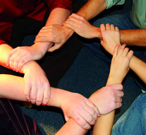 Picture - People playing at holding hands