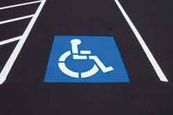 Picture - Logo indicating a parking space reserved for persons with disabilities