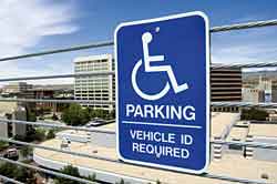 Picture - Sign indicating a parking space reserved for persons with disabilities